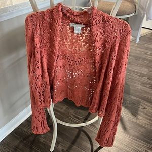 Coral knit sweater with bell sleeves